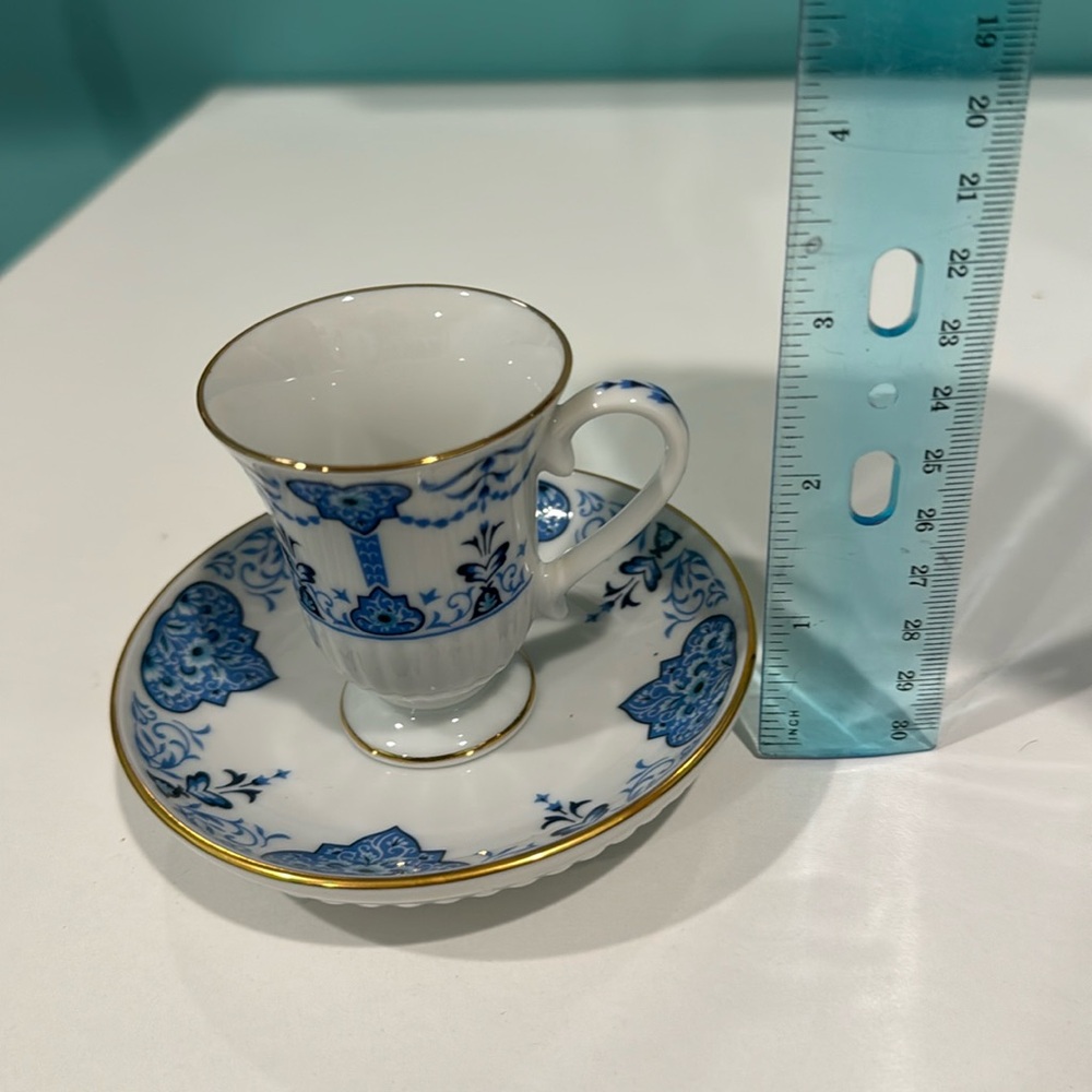 Avon 1984 cup and saucer miniature blue white